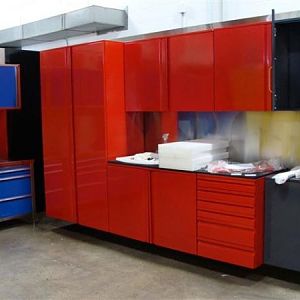 Indianapolis, Indiana - Our showroom showing our FORGED Cabinet line with integral handles in Ferrari Red color.